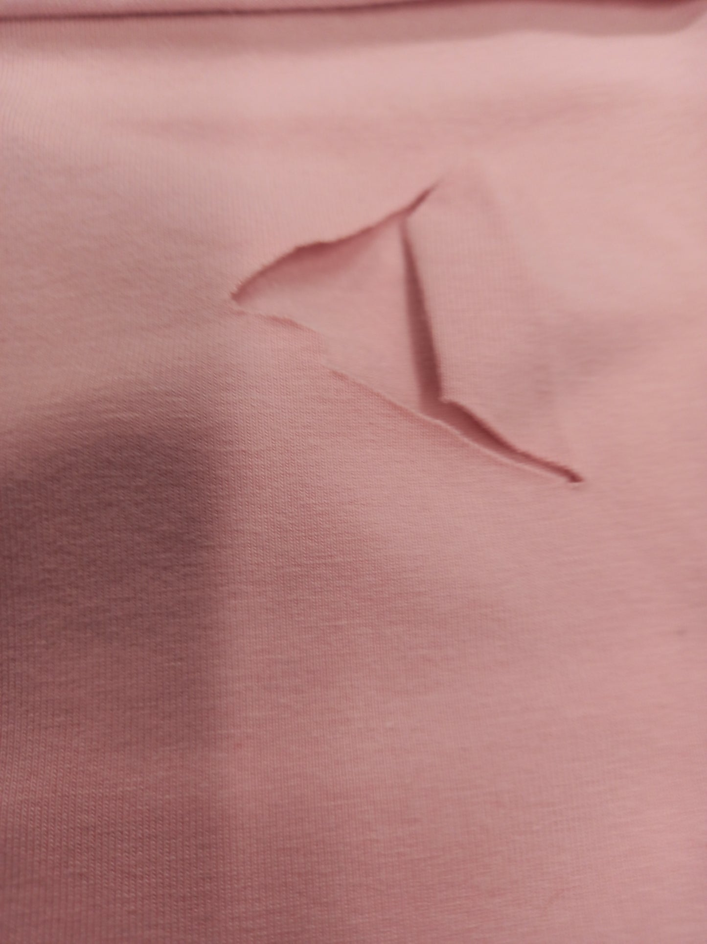 Dusky pink Cotton Spandex - 1.23remnant, small hole photographed