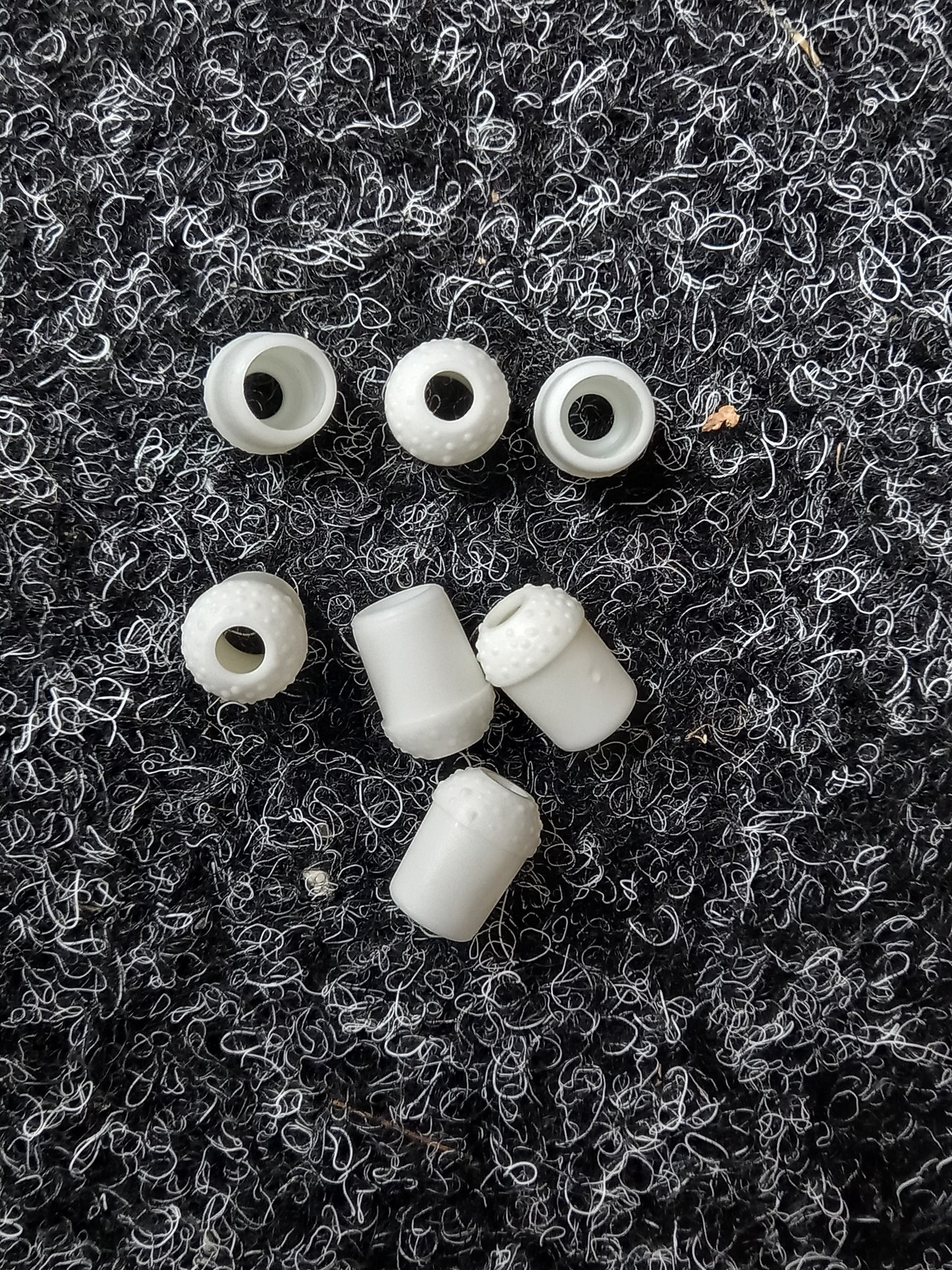 Oval White Plastic Toggles