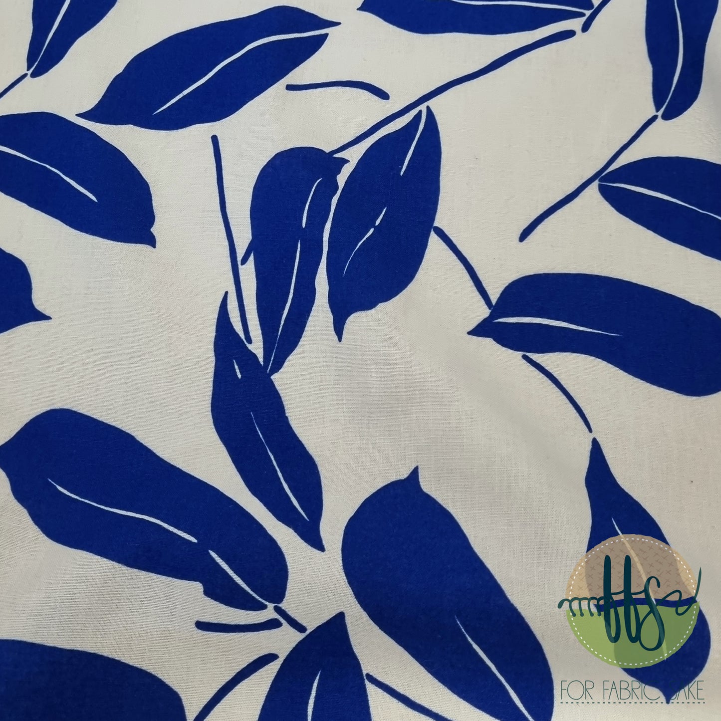 Neon Blue leaves on cream-100% Linen
