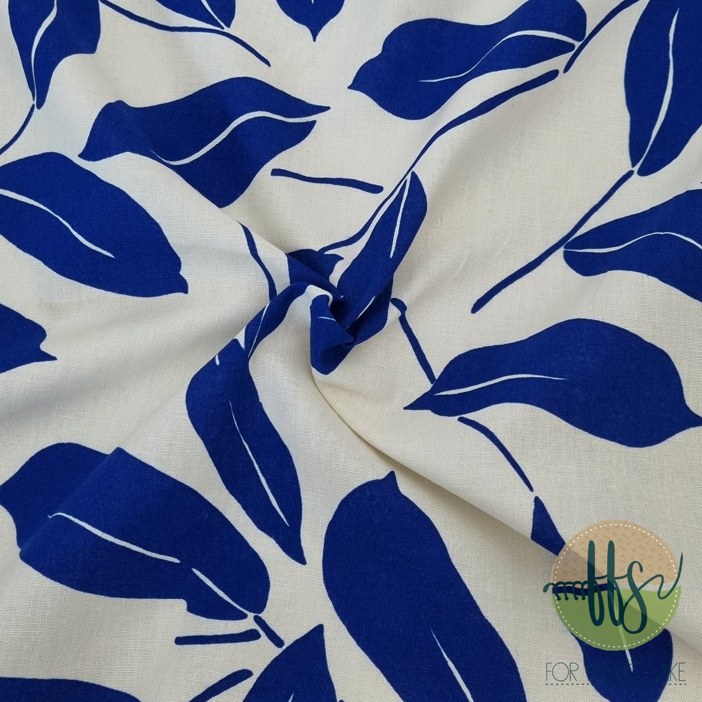Neon Blue leaves on cream-100% Linen